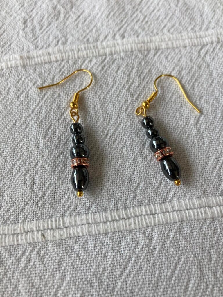 Delightful black and gold earrings made at July Meeting