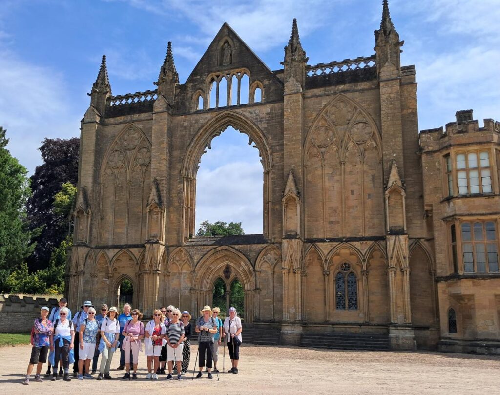 Walks % miles group outside Newstead Abbey on a recent trip